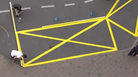 Yellow rectangular sign prohibiting parking on asphalt. Highway crosswalk work Stock Footage 314997139