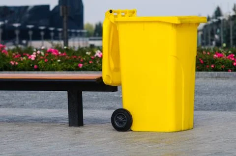 Yellow recycling container Stock Photos