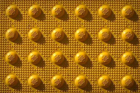 Yellow repeat knob pattern 스톡 사진