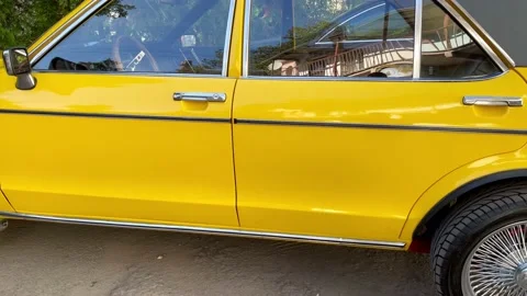 Yellow retro car Stock Footage 162430635