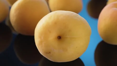 Yellow ripe apricots close-up. Studio video Stock-Footage 133452355