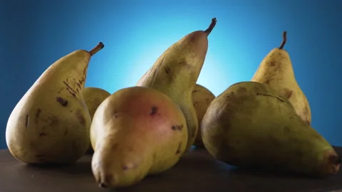 Yellow ripe pears close-up. Studio video Stock Footage 133457889