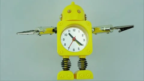 Yellow robot clock isolated on white background. Stock Footage 146487565