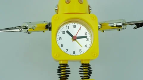 Yellow robot clock isolated on white background. Stock Footage 146761496