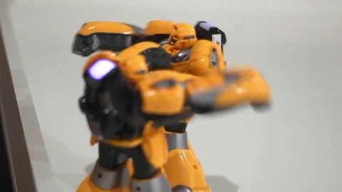 Yellow robots boxing. Close up of battle robot. Two robot fight Stock Footage 72792583