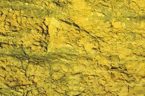 Yellow rock texture Stock Photos
