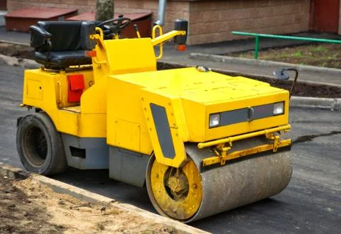  Yellow roller for asphalt. Stock Photos