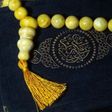 Yellow rosary Stock Photos