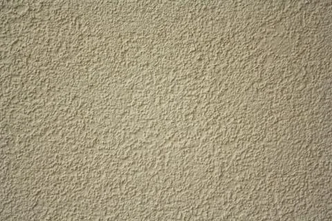 Yellow roughcast wall Stock Photos