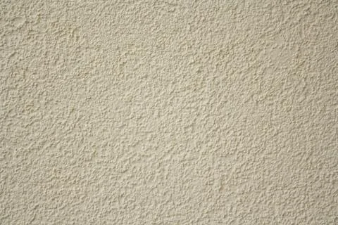 Yellow roughcast wall Stock Photos