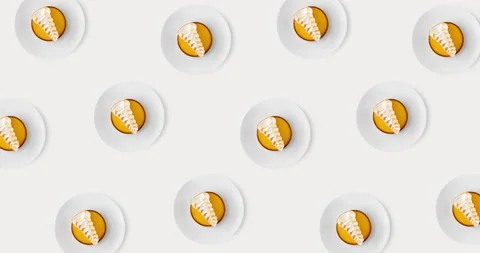 Yellow round pastry top view pattern diagonal Stock Footage 137668989