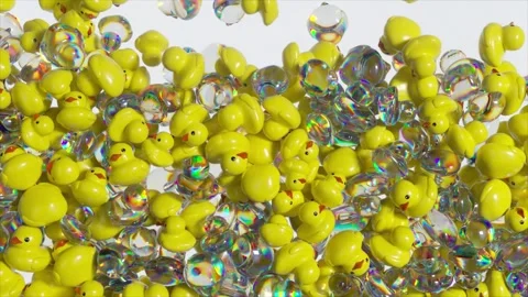 Yellow rubber ducks cascading onto pristine white surface, progressively filling Stock Footage 309991174