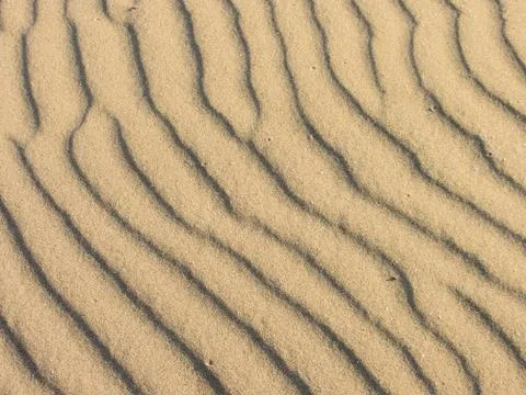 Yellow sand moved by the wind Stock Photos