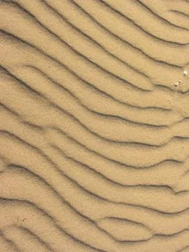 Yellow sand moved by the wind Stock Photos