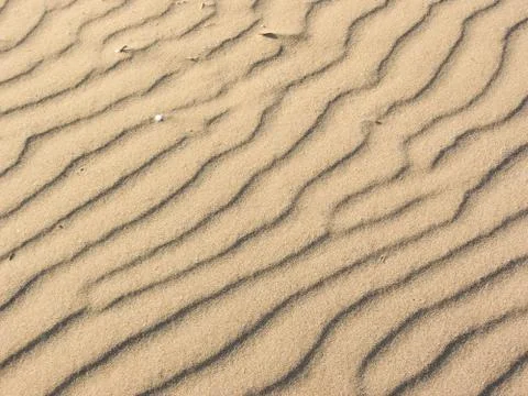 Yellow sand moved by the wind Stock Photos