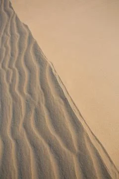 Yellow sand texture for background Stock Photos