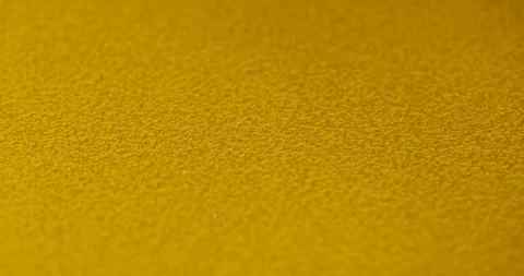 Yellow sandpaper for processing metal, sandpaper for polishing surfaces made of Stock Footage 311900942