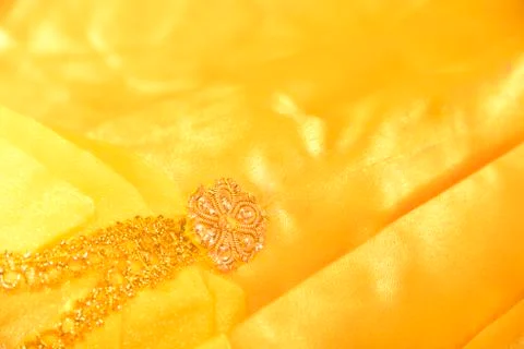 Yellow satin with pattern Stock Photos