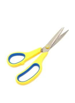 Yellow scissors isolated on a white background 写真素材