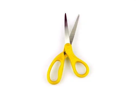 Yellow scissors isolated on a white background Stock Photos