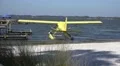 Yellow Seaplane At Dock By Dock HD Footage