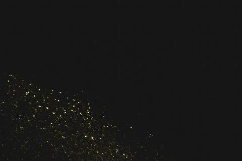 Yellow sequins dark background High resolution photo Stock Photos