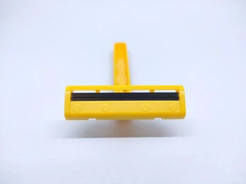 Yellow Shaving razor Stock Photos