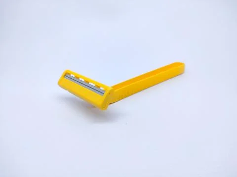 Yellow Shaving razor Stock Photos