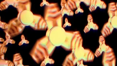 Yellow shiny fidget spinners, rotating on a black background, cyclic animation. Stock Footage 89637626