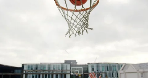Yellow-shirted player receiving ball dribbling toward key aiming dunk on Stock Footage 330732989