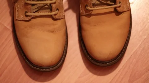 Yellow shoes Stock Footage 69996160