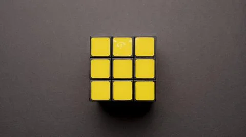 Yellow side of a color cube Stock Photos