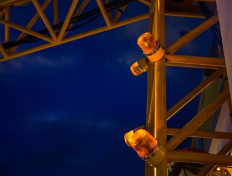 Yellow siren on the crane post 스톡 사진