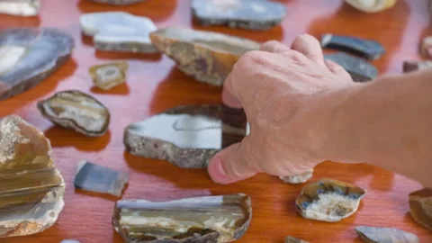 Yellow slice of agate. Natural agate closeup isolated on stone background. Stock Footage 119201165