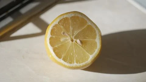 Yellow sliced Lemon on the table image Stock Photos