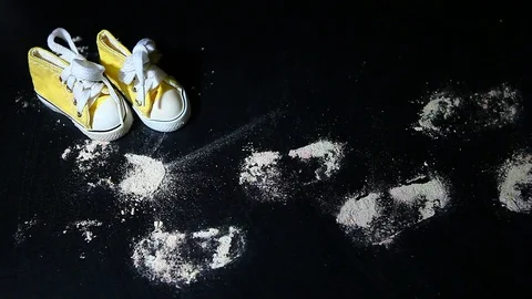 Yellow small shoes white trace hd footage Stock Footage 103868951
