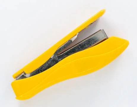 Yellow small stapler Stock Photos