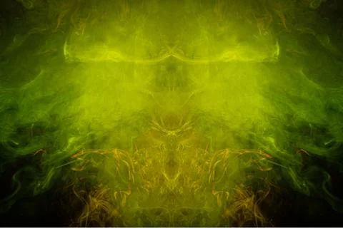 Yellow smoke of pattern  in the form of horror monster on a dark isolated bac Stock Photos