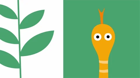 Yellow snake head emerging between green leaves with cartoon eyes Video stock 317603674