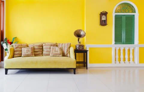 Yellow sofa Stock Photos