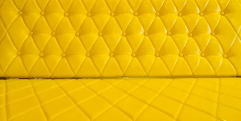 Yellow sofa upholstery leather pattern background Stock Photos