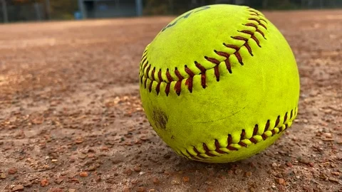 Yellow Softball Slow Motion Push In Stock Footage 125348619