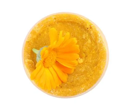 Yellow solid shampoo bar and flower isolated on white, top view. Hair care Foto stock