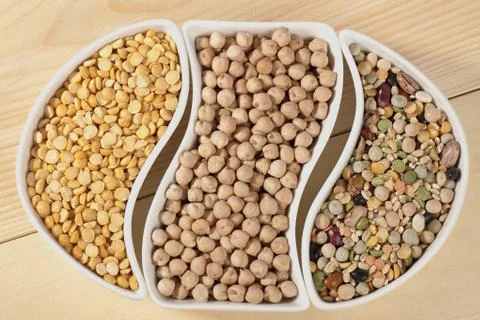 Yellow split beans soybeans and mixed legumes Stock Photos