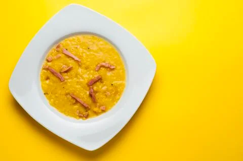 Yellow split pea soup with ham Stock Photos
