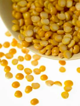 Yellow Split Peas in a bowl Stock Photos