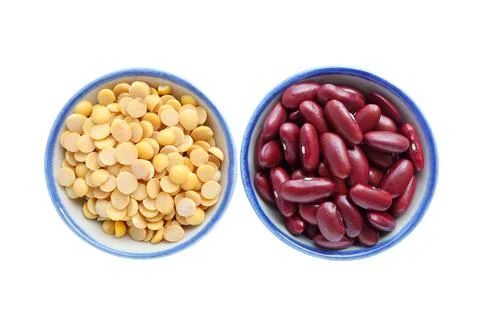 Yellow split peas in a bowl, red kidney seeds in a bowl Stock Photos