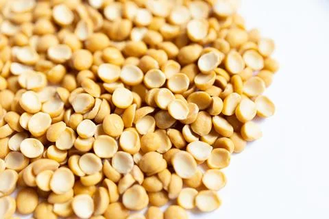 Yellow split peas on white background Stock Photos