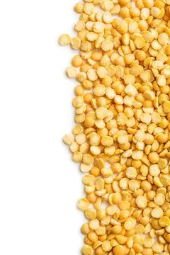 Yellow split peas. Yellow split peas isolated on white background. Copyrig... Stock Photos