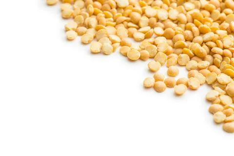 Yellow split peas. Yellow split peas isolated on white background. Copyrig... Stock Photos